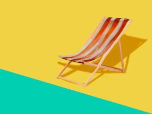 orange and gray striped folding lounge chair